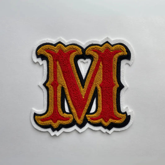 gothic M chenille letter